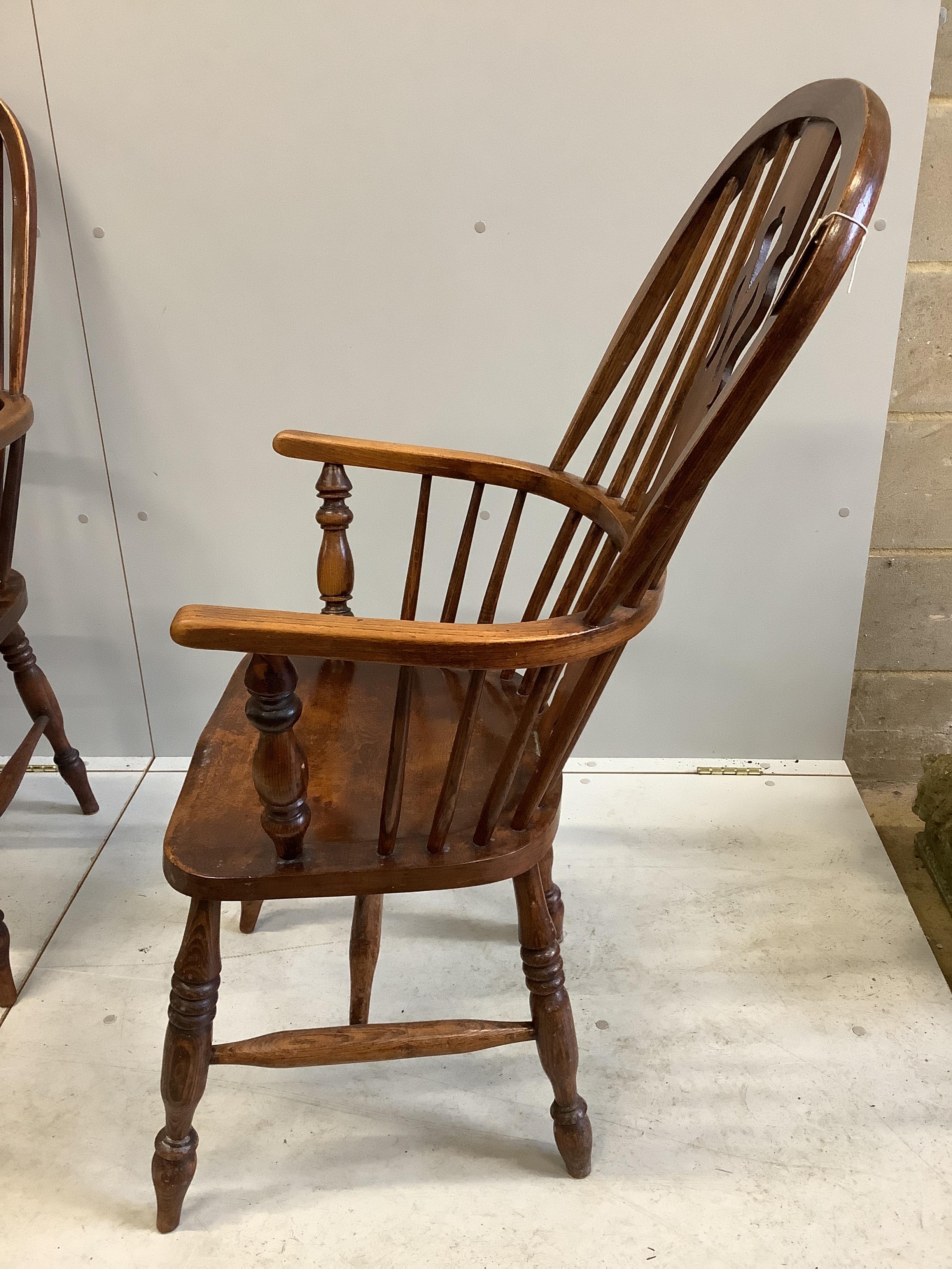 A set of six 19th century ash and elm Windsor armchairs with H stretchers and later leatherette squab seats, width 58cm, depth 38cm, height 116cm